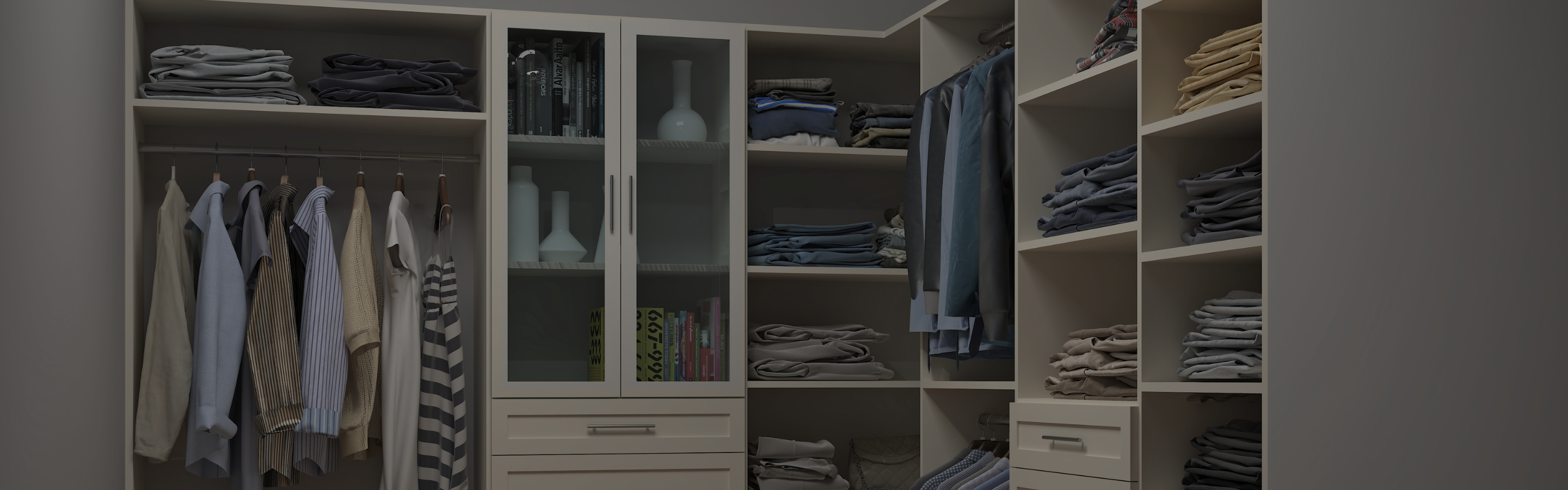 Custom walk in closet with glass front cabinetry