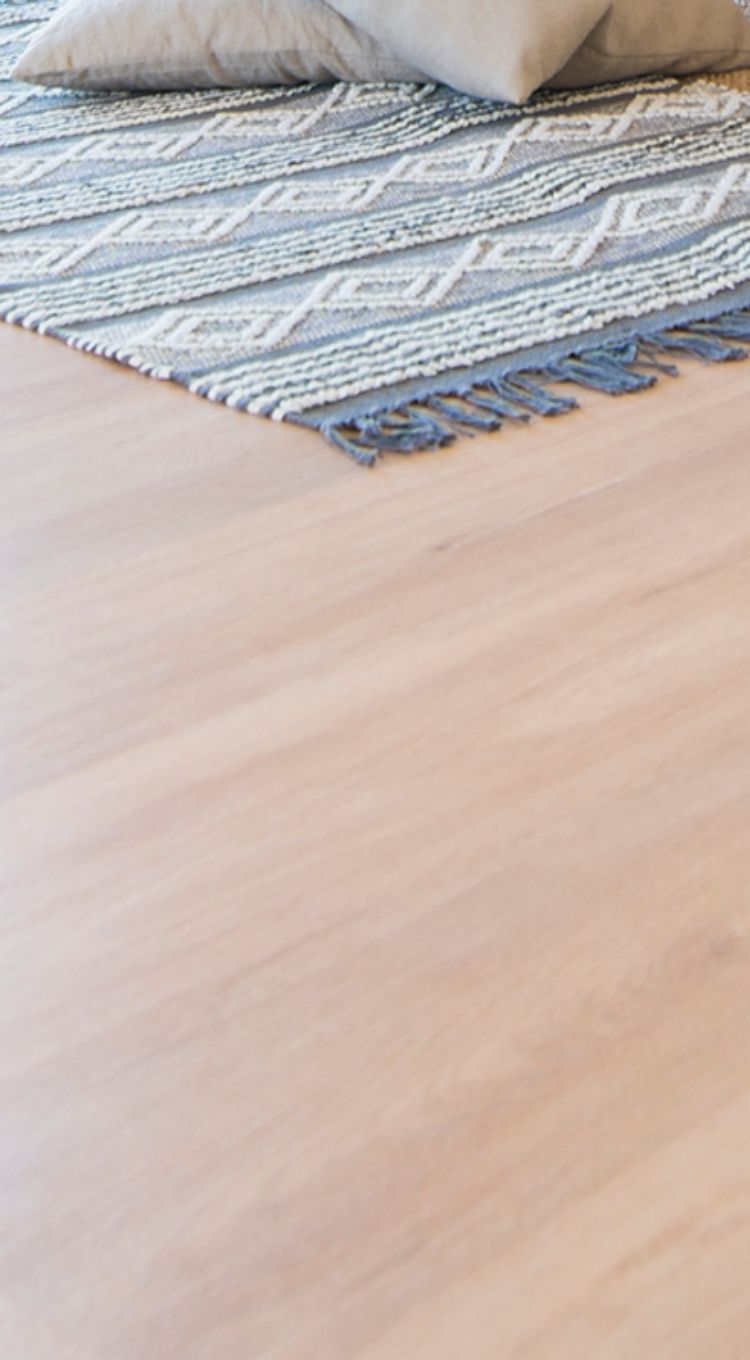 laminate flooring with blue area rug